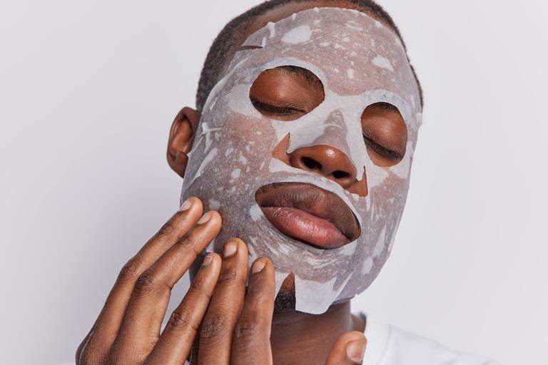 Man applying face mask