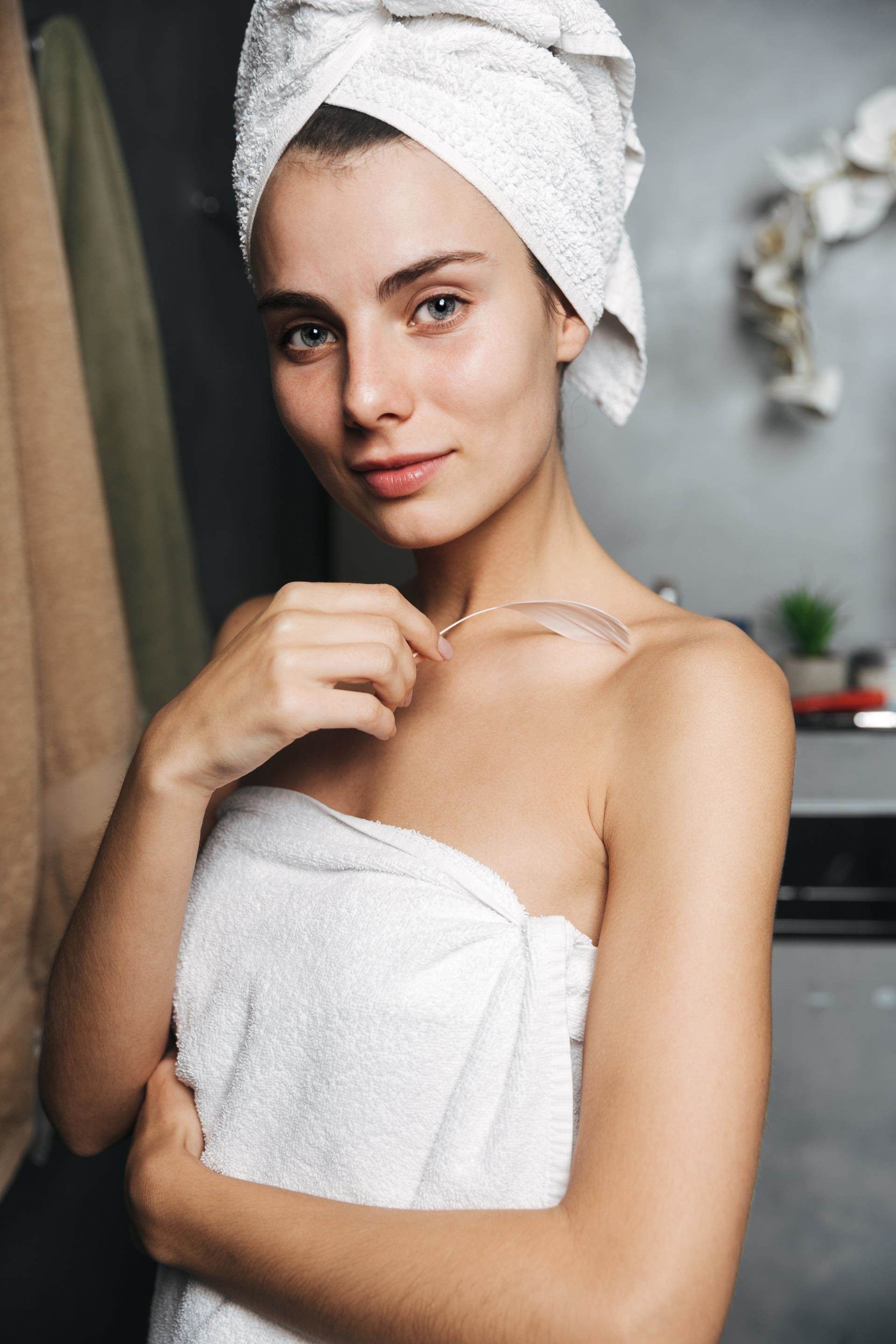 women wrapped hair in towel