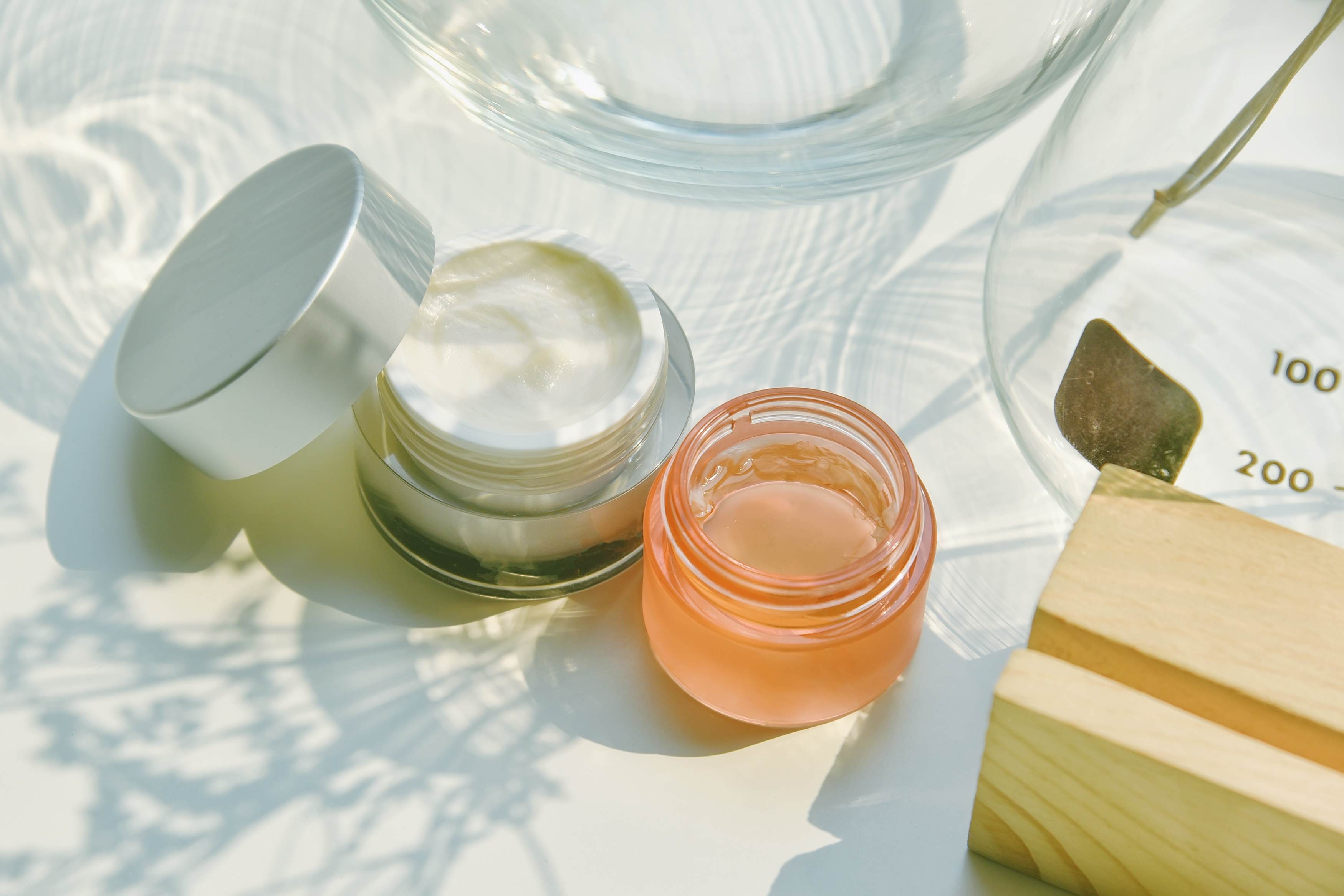 tub of skin care products in sunny setting