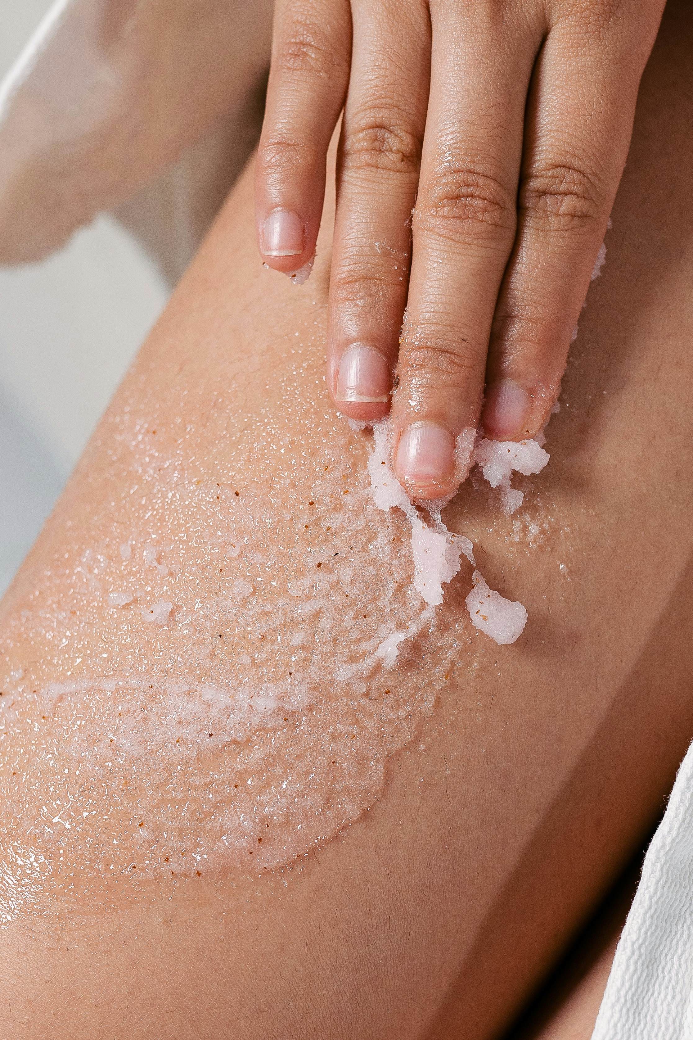 cleansing sand on legs
