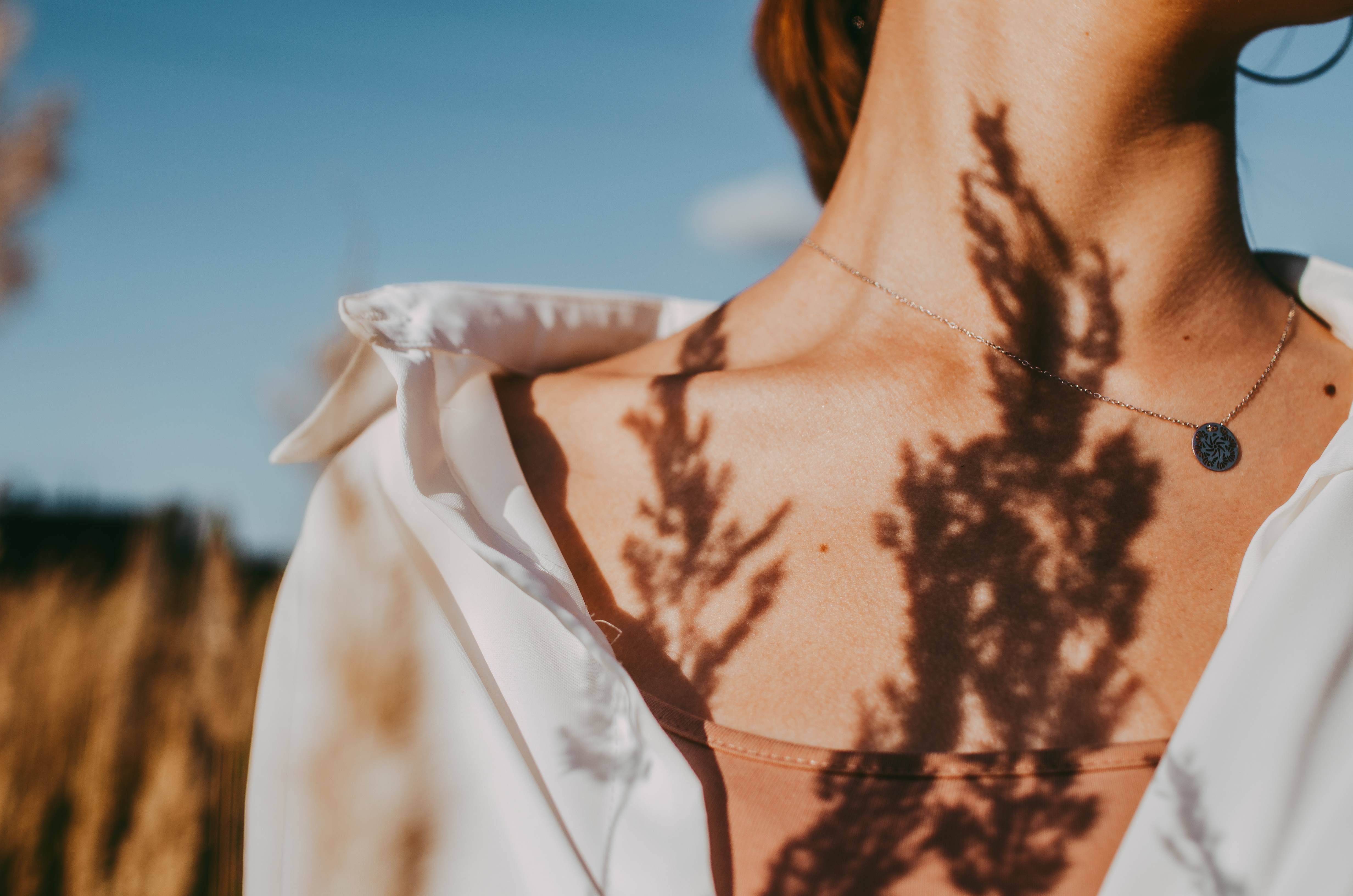 shadow of plant on collar bone